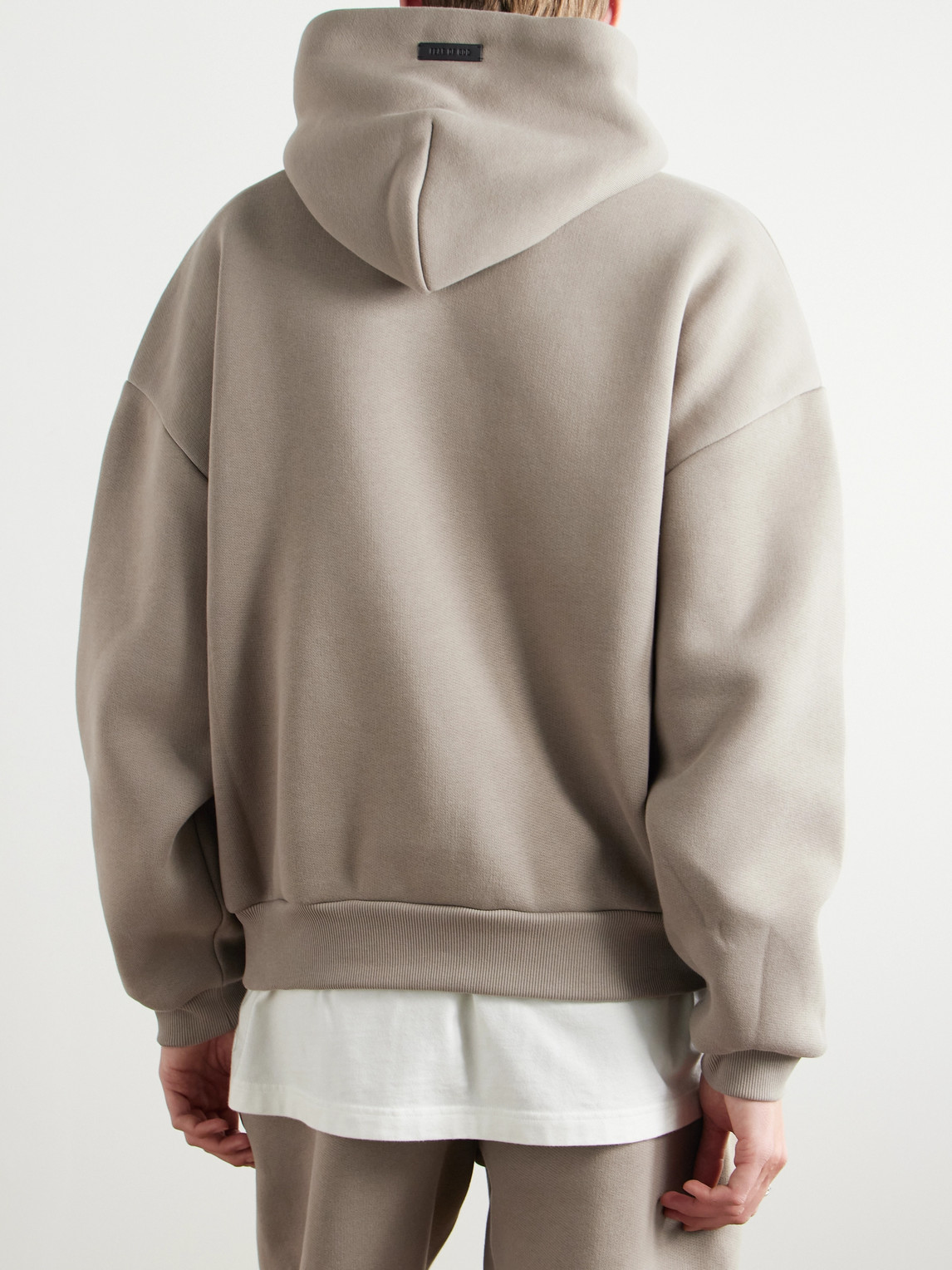Shop Fear Of God Eternal Logo-embossed Cotton-blend Jersey Hoodie In Brown