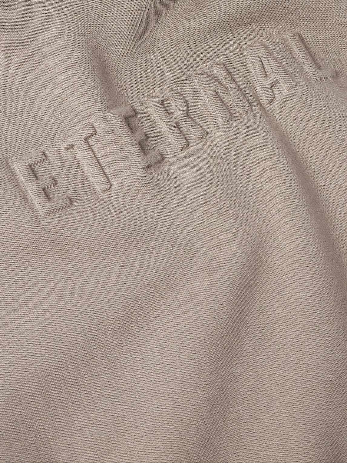 Shop Fear Of God Eternal Logo-embossed Cotton-blend Jersey Hoodie In Brown