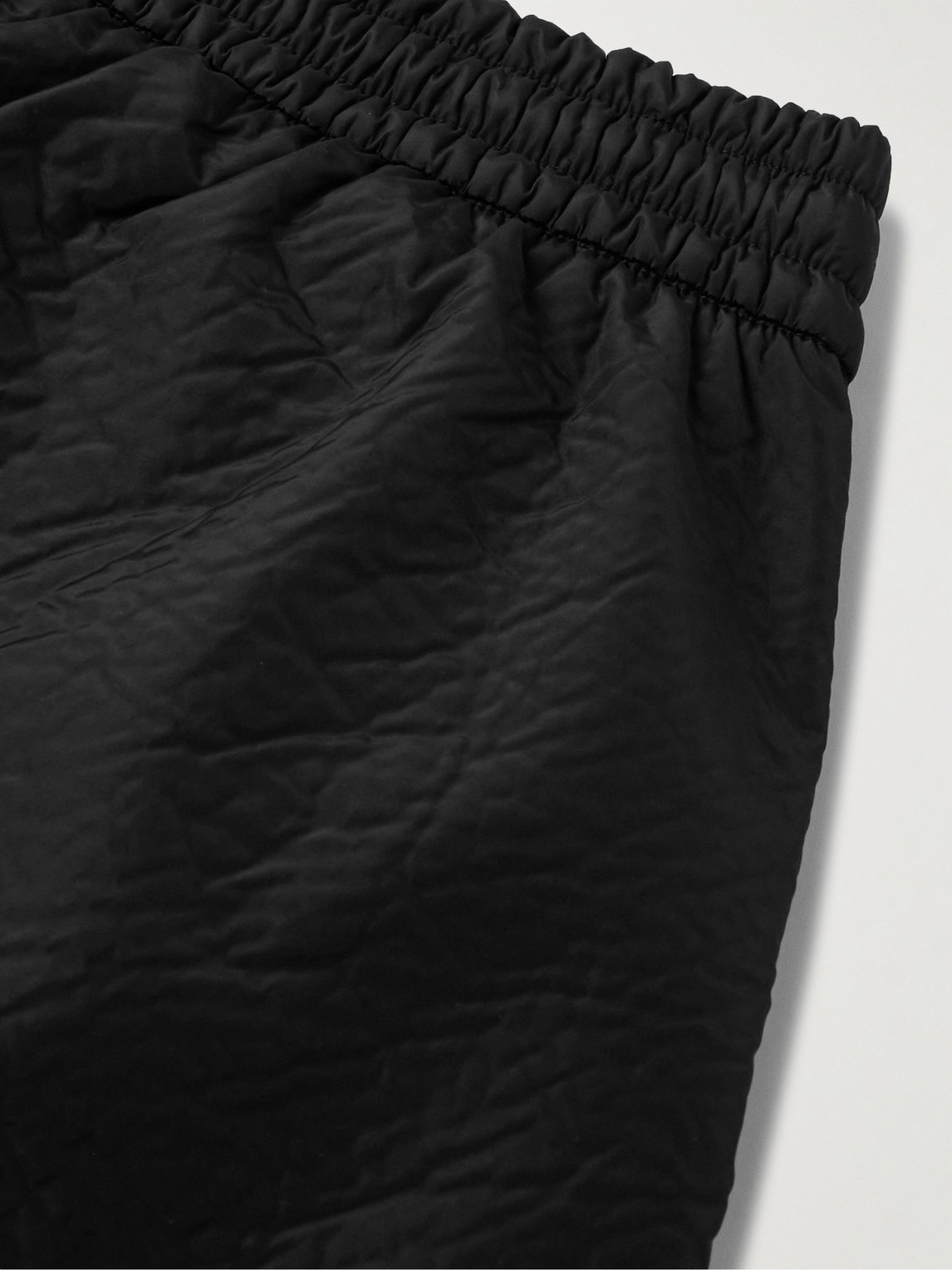 Shop Fear Of God Wide-leg Logo-appliquéd Textured-shell Drawstring Shorts In Black