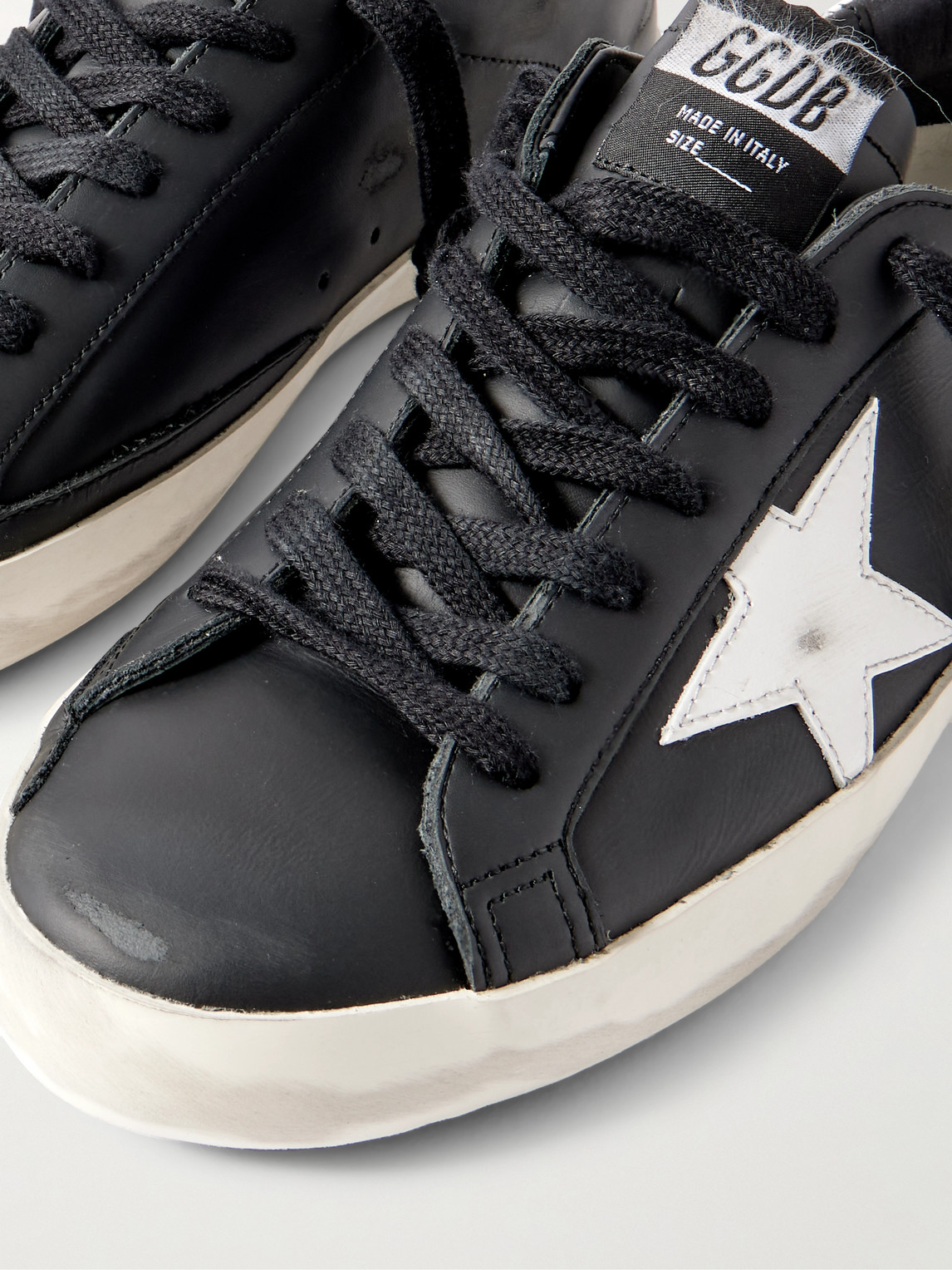 Golden Goose 'super-star' Black Low Top Sneakers With Logo Patch And Suede Details In Leather Man In Black