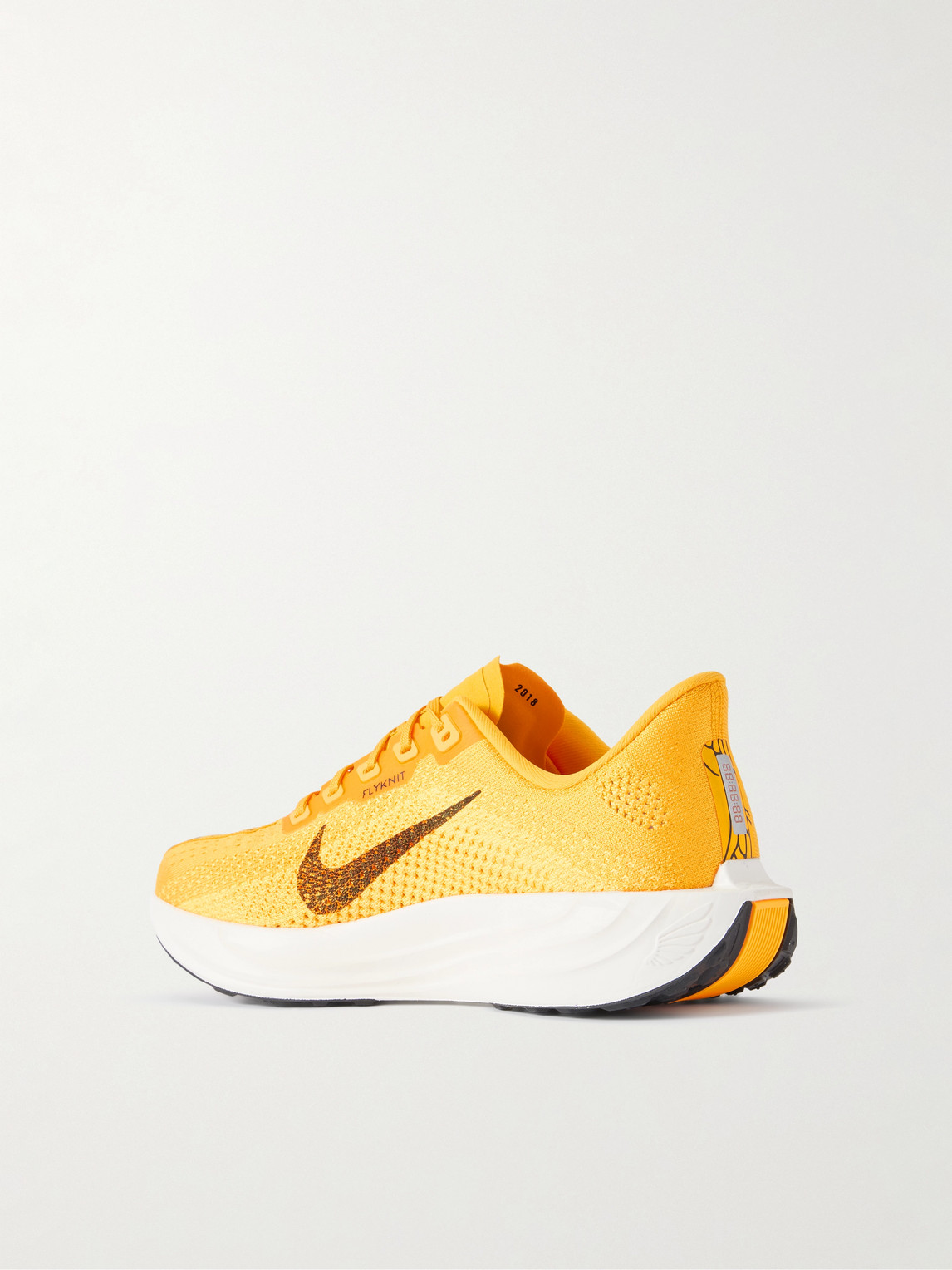 Nike Pegasus Plus Lv8 Logo-print Flyknit Running Sneakers In Yellow
