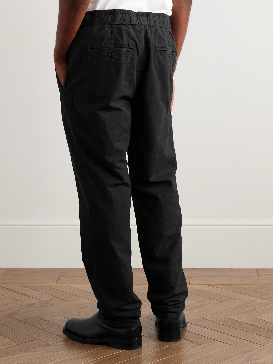 Shop James Perse Tapered Garment-dyed Cotton And Hemp-blend Trousers In Black