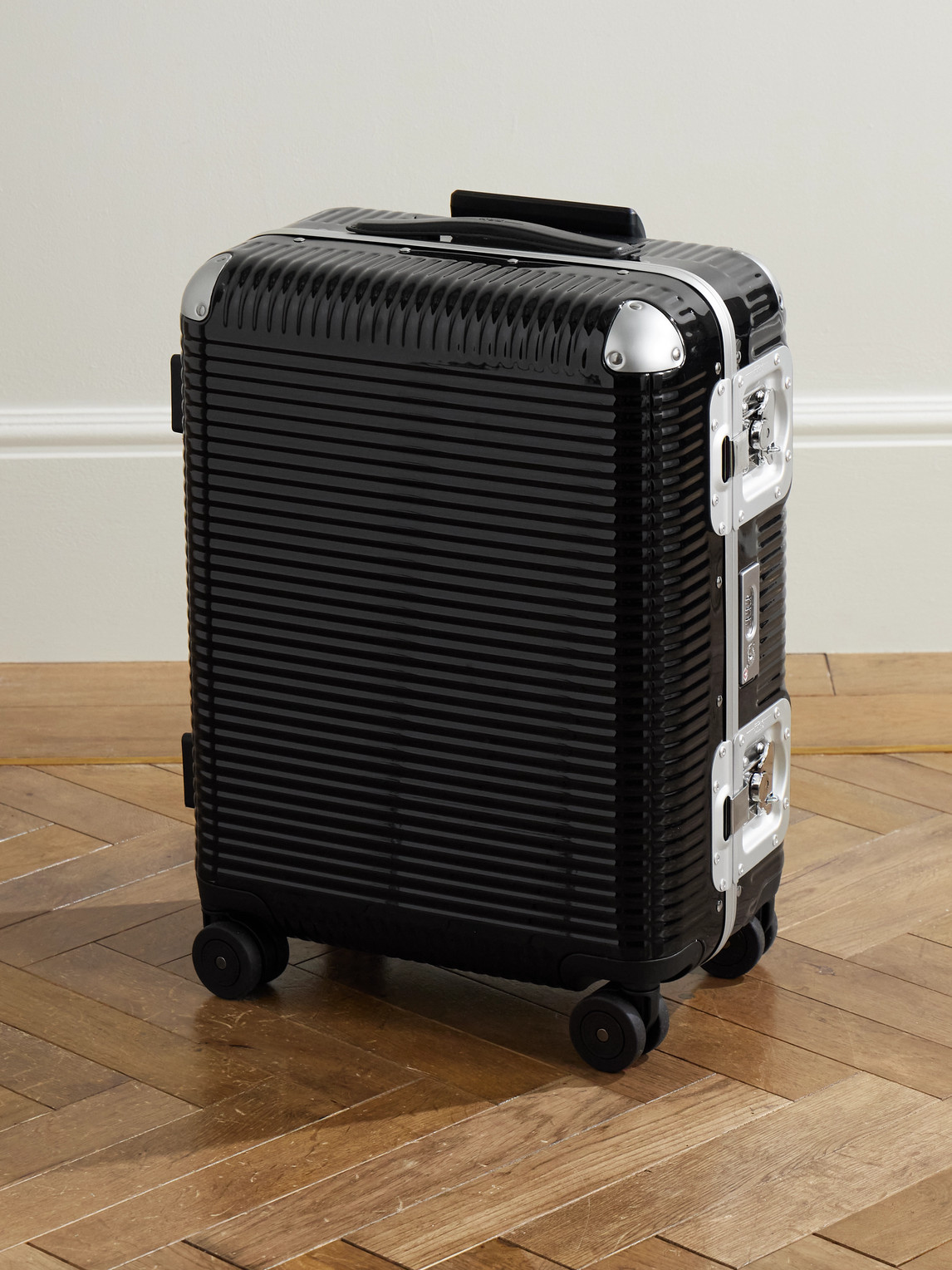 Fpm Milano Bank Light 55cm Leather-trimmed Polycarbonate Spinner Suitcase In Black