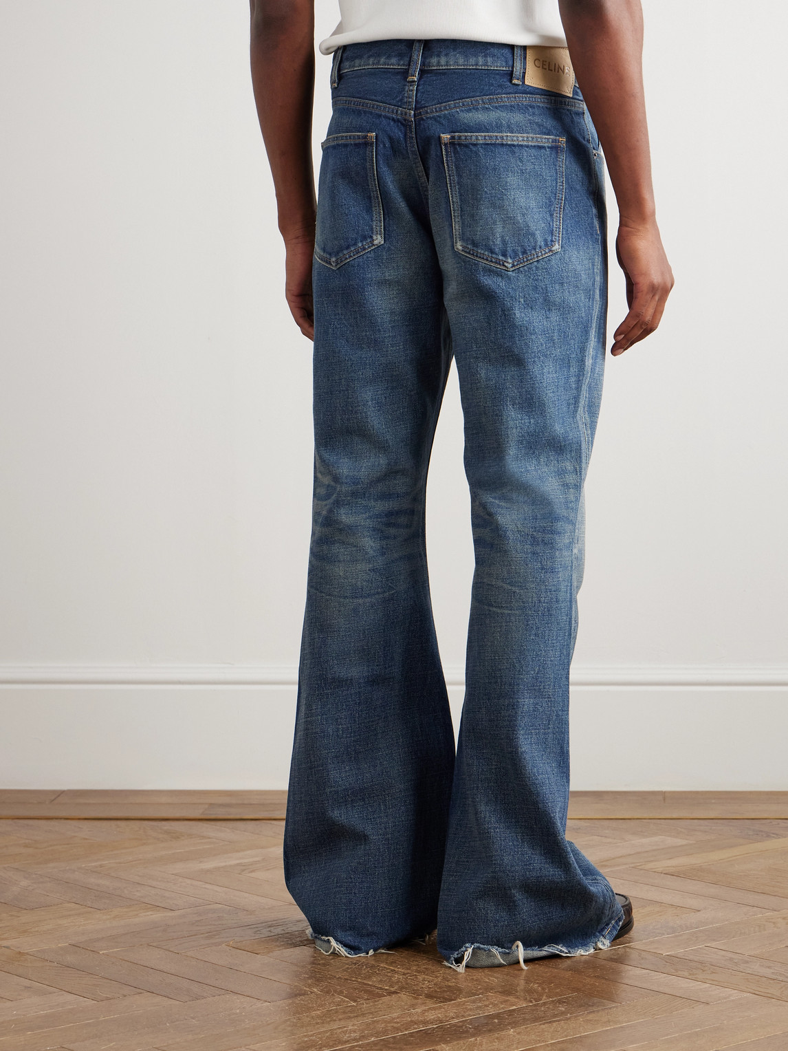 Celine Marco Flared Frayed Jeans In Blue
