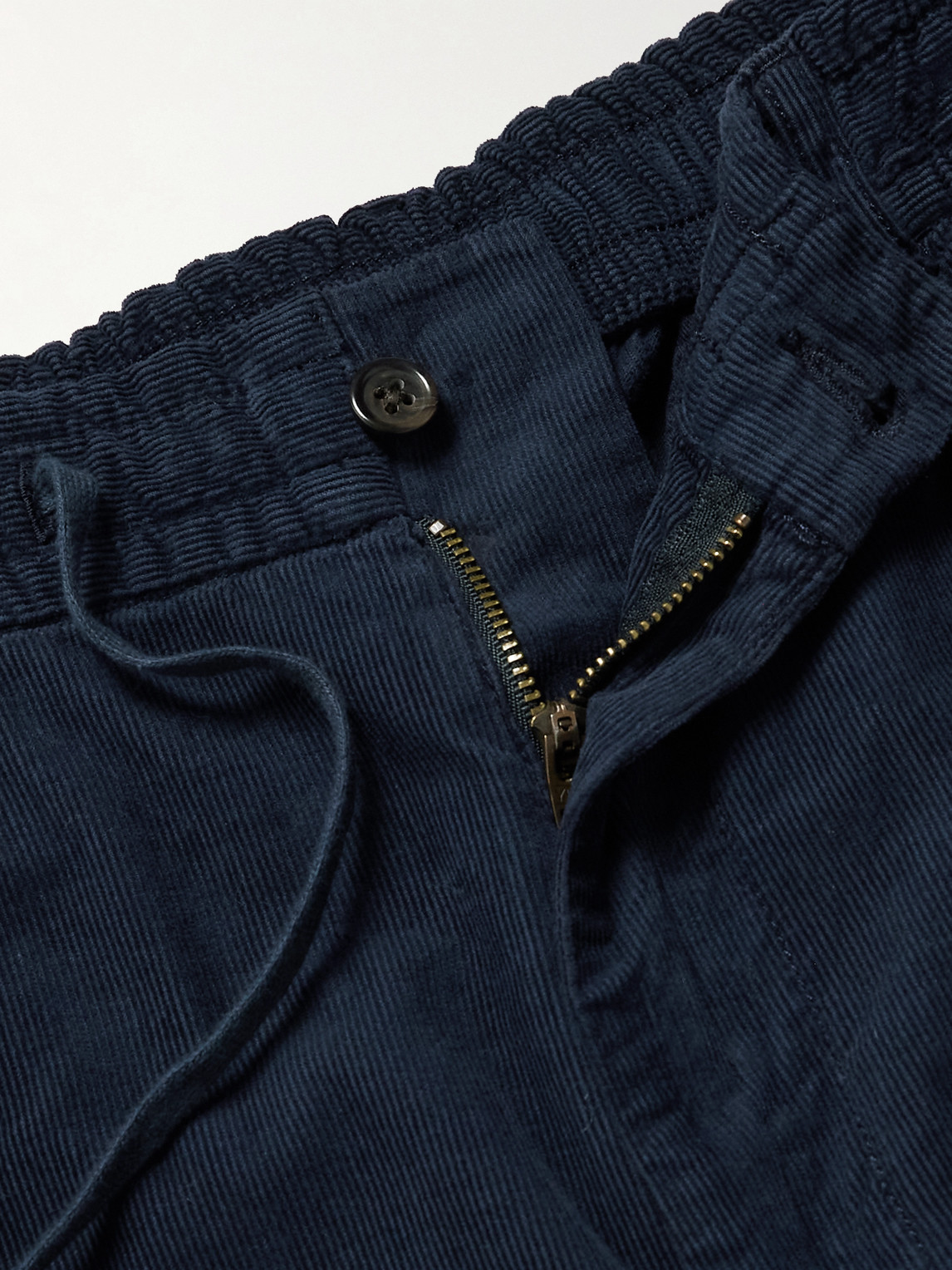 Polo Ralph Lauren Pleated Tapered Stretch Cotton-corduroy Drawstring Trousers In Blue