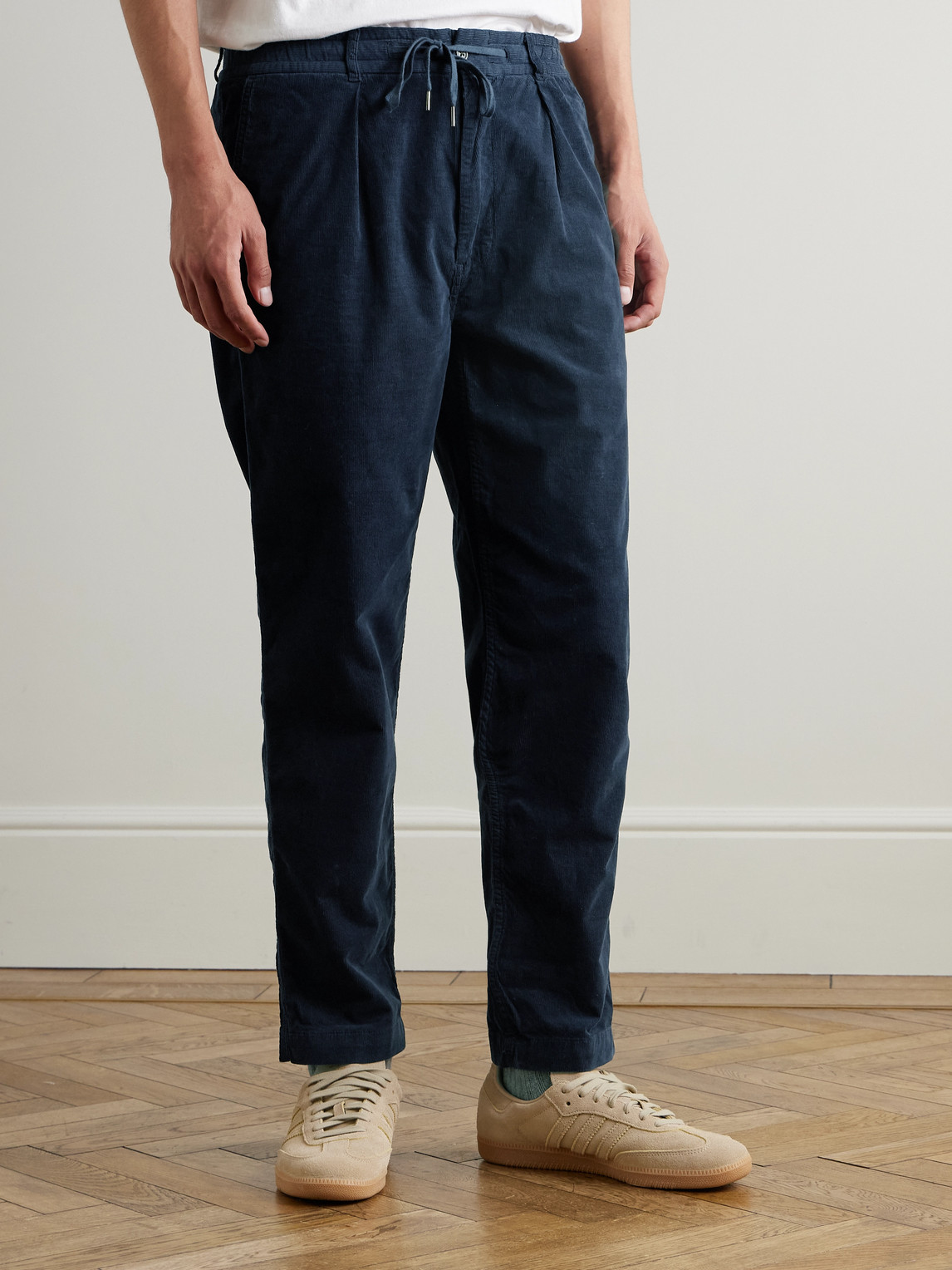 Polo Ralph Lauren Pleated Tapered Stretch Cotton-corduroy Drawstring Trousers In Blue
