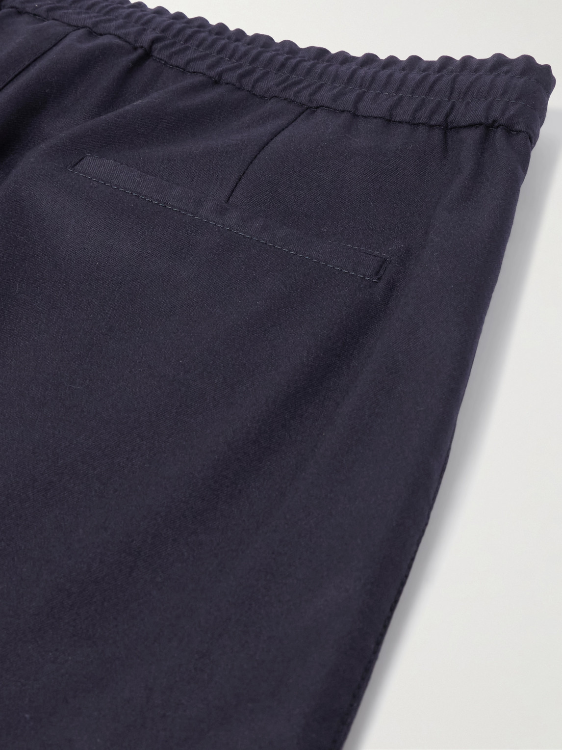 Brunello Cucinelli Tapered Pleated Virgin Wool-flannel Drawstring Trousers In Blue