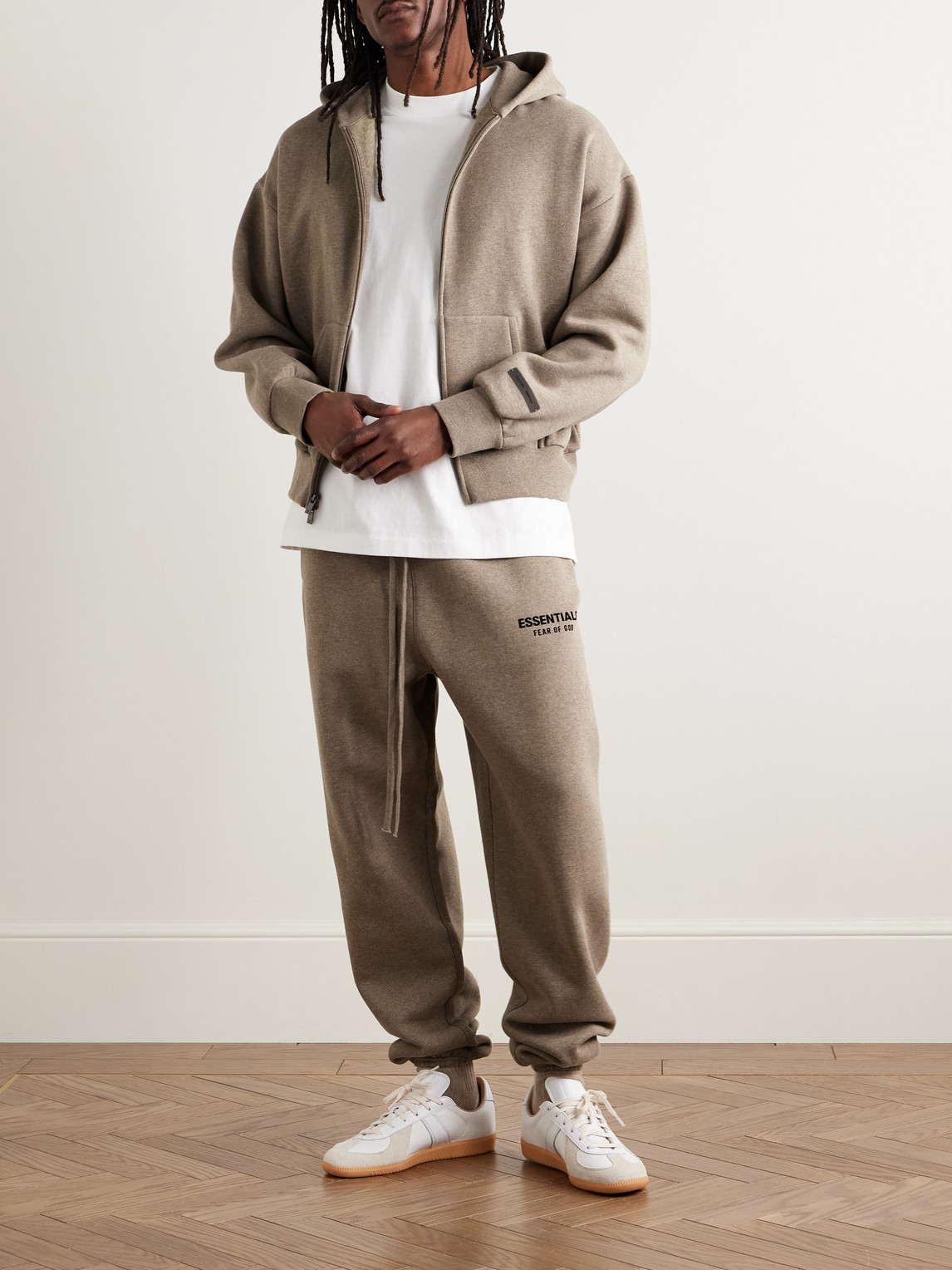 Essentials Tapered Logo-appliquéd Cotton-blend Jersey Sweatpants In Brown