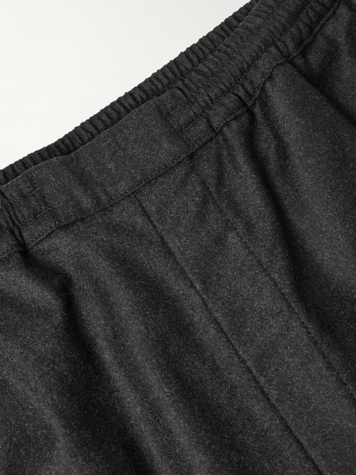 A Kind Of Guise Banasa Tapered Virgin Wool Trousers In Black
