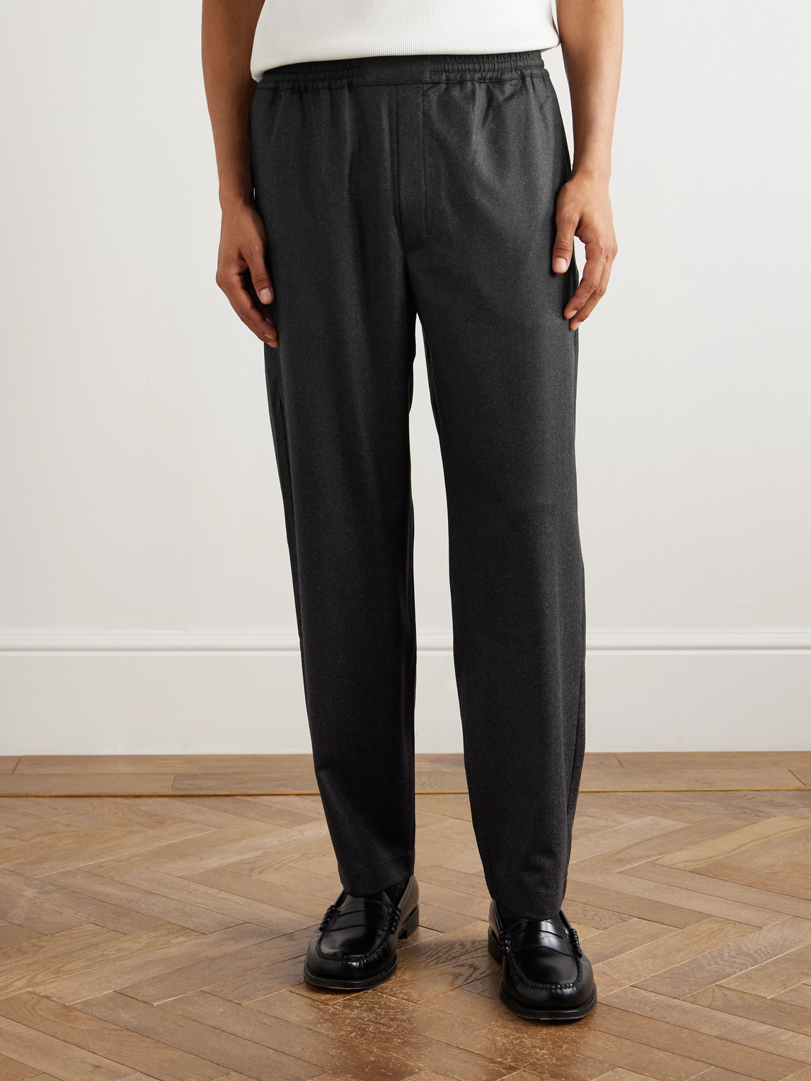 A Kind Of Guise Banasa Tapered Virgin Wool Trousers In Black
