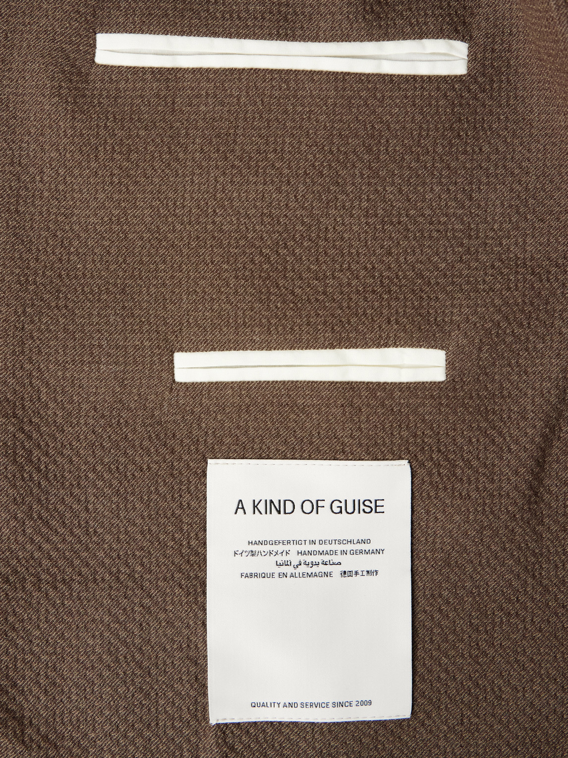 A Kind Of Guise Shinji Textured-woven Suit Jacket In Brown