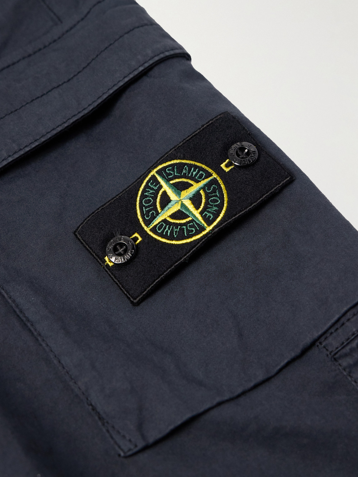 Stone Island Tapered Garment-dyed Cotton-blend Twill Cargo Trousers In Blue