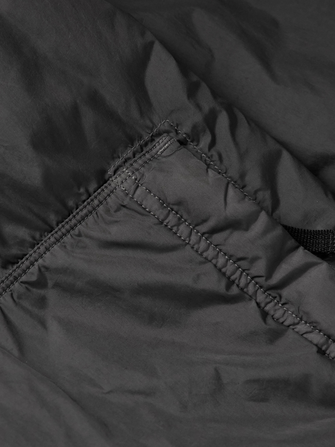 Stone Island Logo-appliquéd Garment-dyed Padded Crinkle Reps Nylon Hooded Jacket In Black