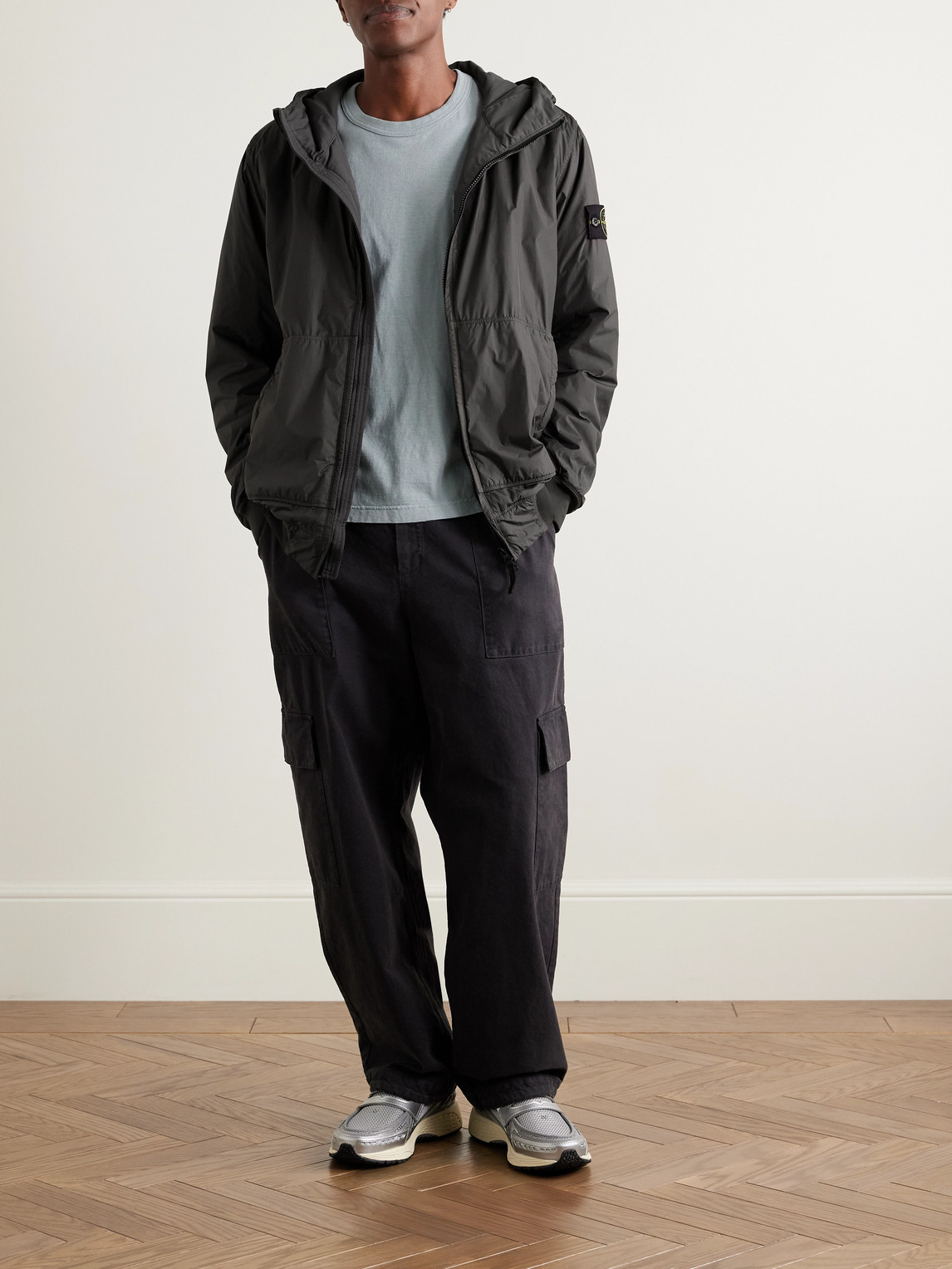 Stone Island Logo-appliquéd Garment-dyed Padded Crinkle Reps Nylon Hooded Jacket In Black