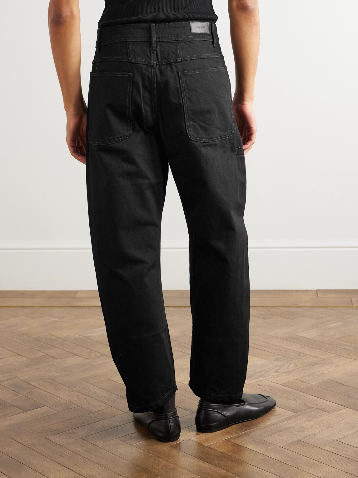 Lemaire Twisted Tapered Jeans In Black