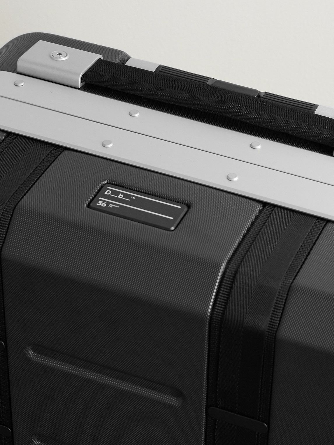 Db Journey Ramverk Pro Polycarbonate And Aluminium Carry-on Suitcase In Black