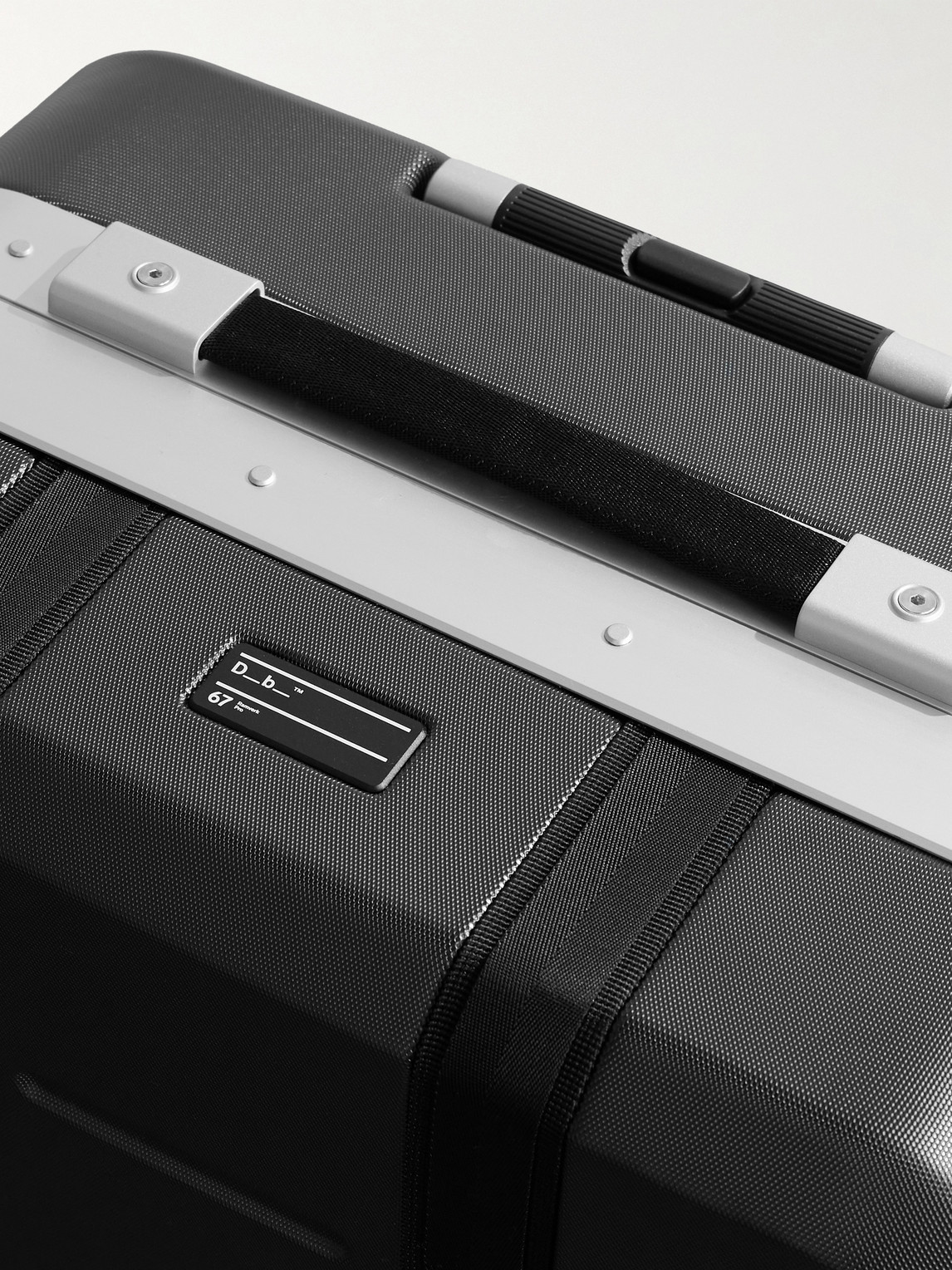 Db Journey Ramverk Pro Medium Polycarbonate And Aluminium Check-in Suitcase In Black
