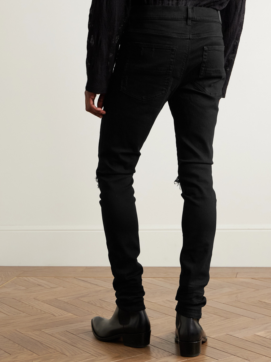Amiri Mx1 Skinny-fit Leather-panelled Distressed Jeans In Black