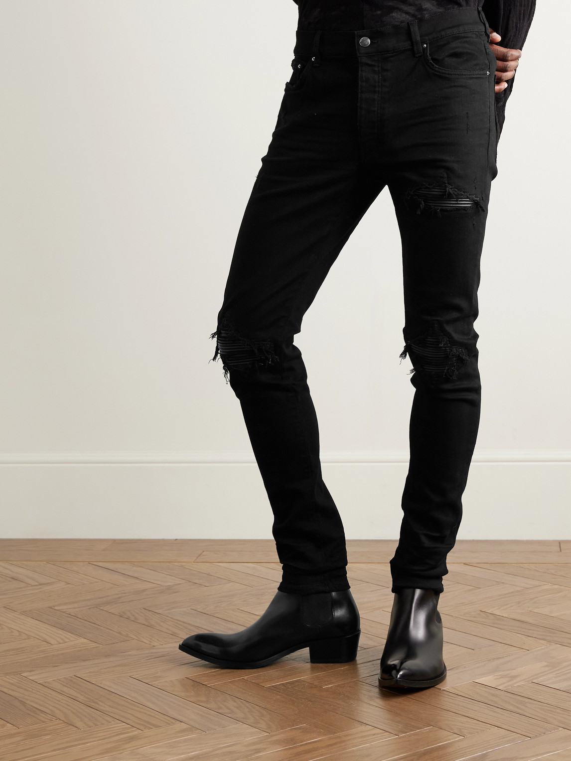 Amiri Mx1 Skinny-fit Leather-panelled Distressed Jeans In Black