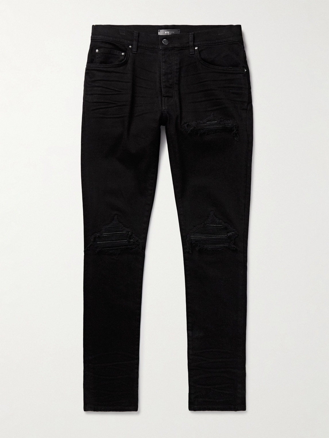 Amiri Mx1 Skinny-fit Leather-panelled Distressed Jeans In Black