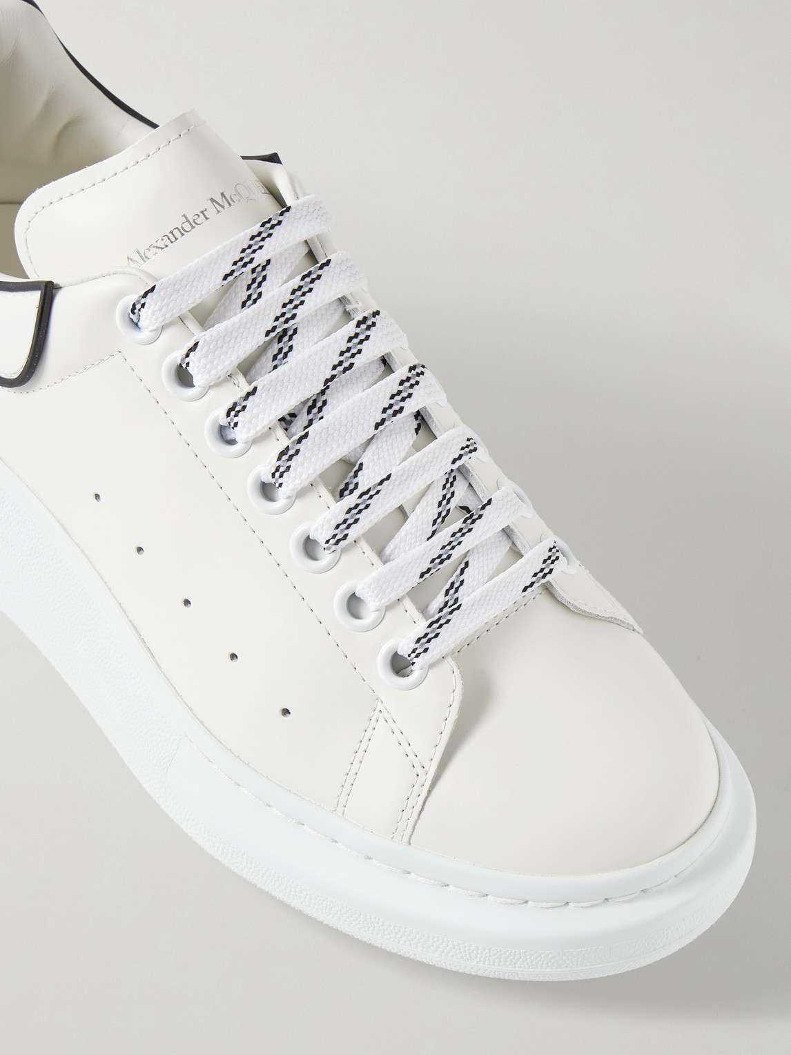 Alexander Mcqueen Chunky Leather Sneakers Featuring Perforated Profiles In White