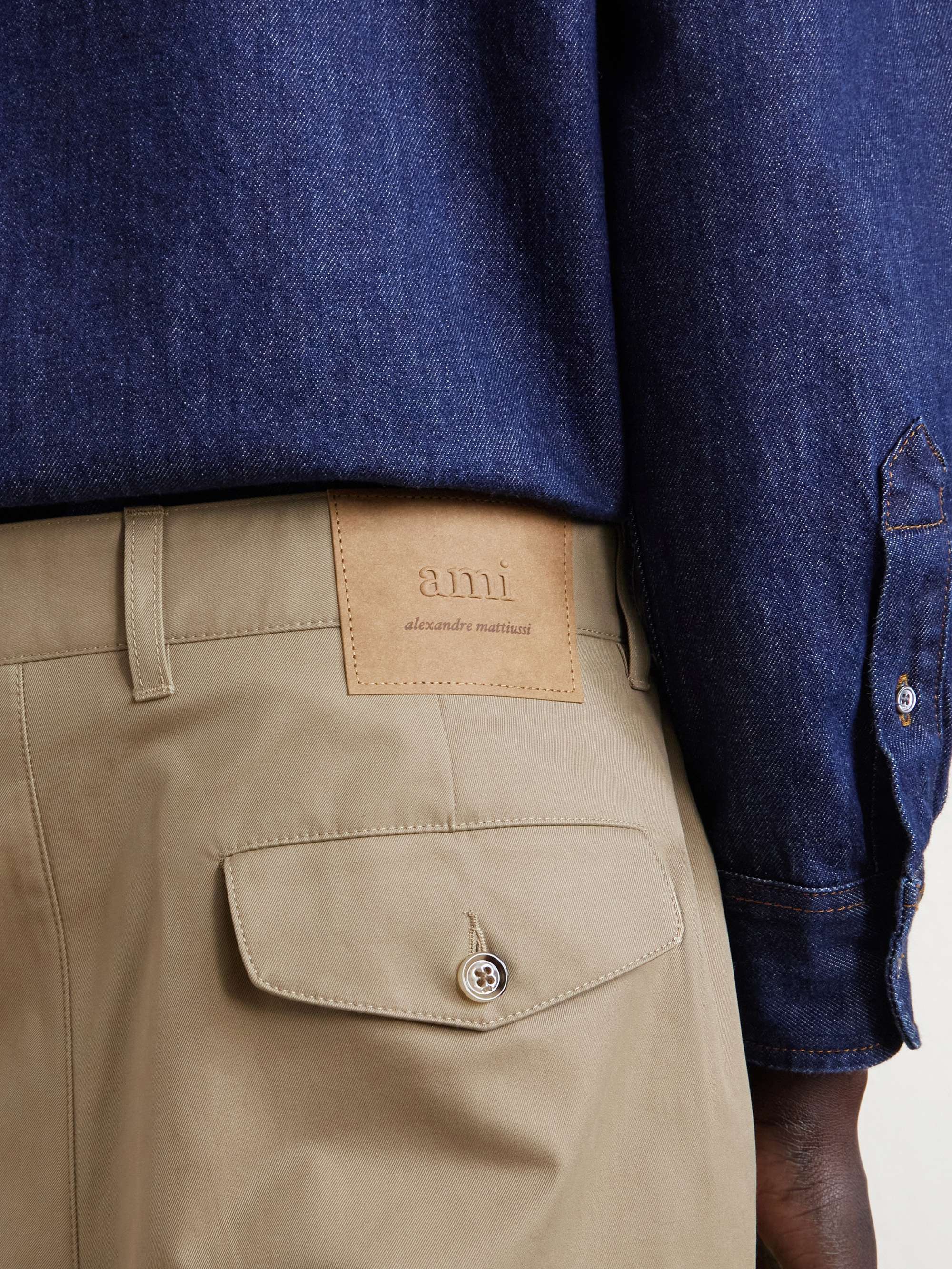 AMI PARIS Carrot Tapered Pleated Cotton-Gabardine Trousers for Men