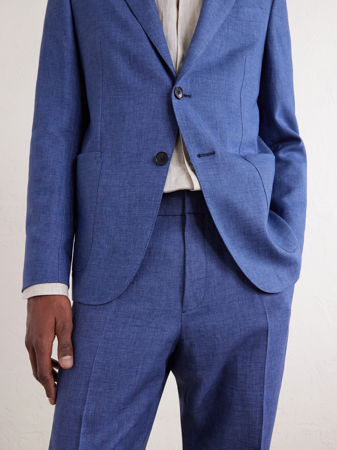 Tapered Pleated Linen Trousers