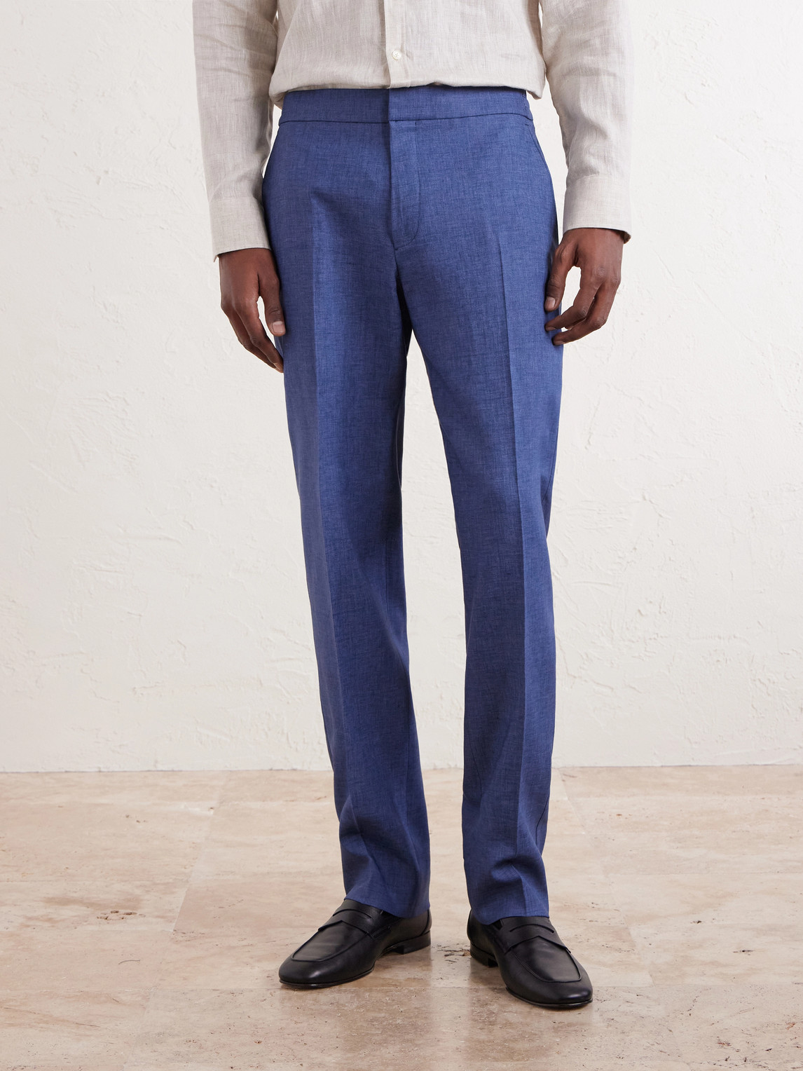 Tapered Pleated Linen Trousers