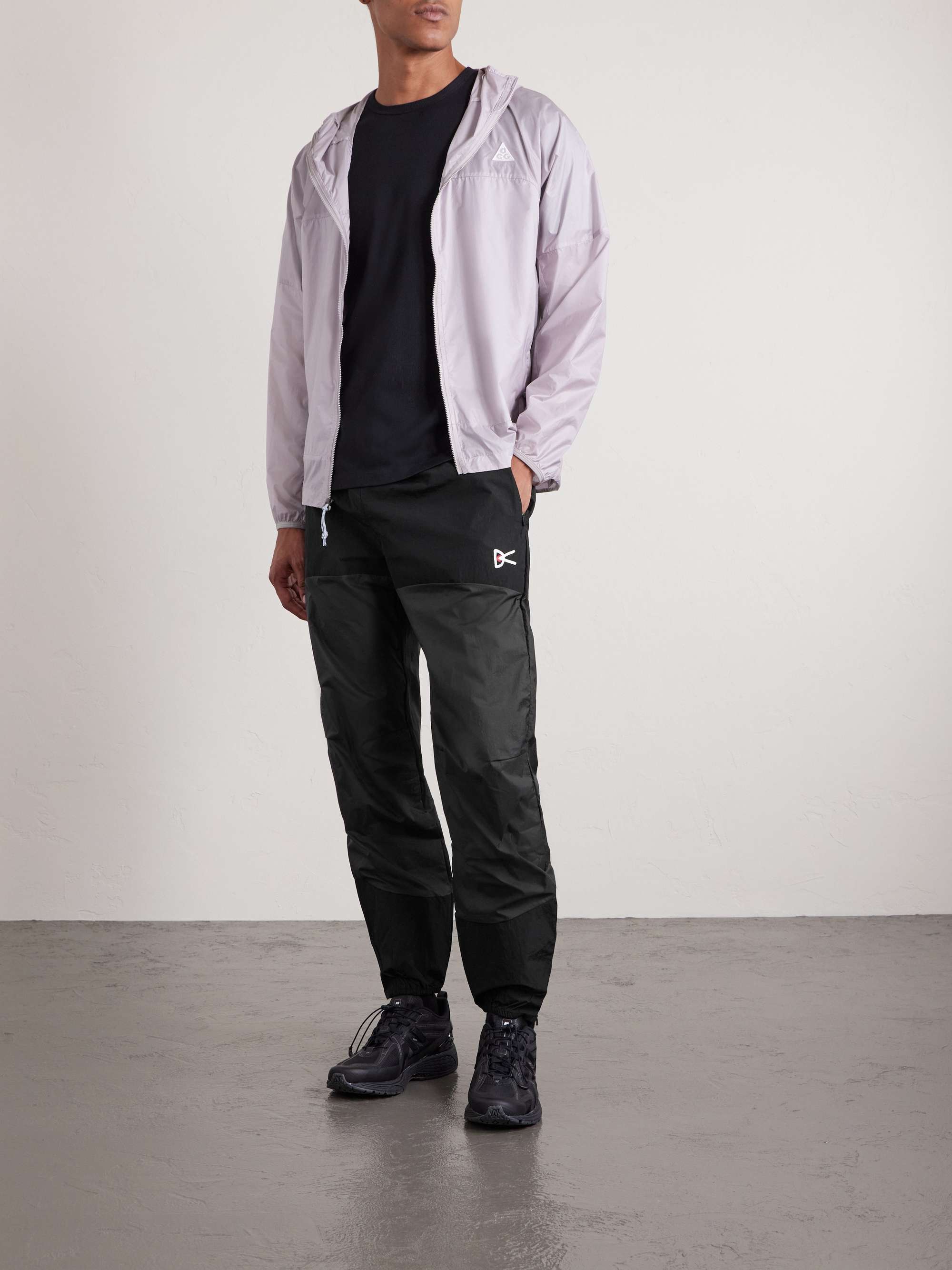 DISTRICT VISION Zanzie Tapered Logo-Print Stretch-Shell Track Pants