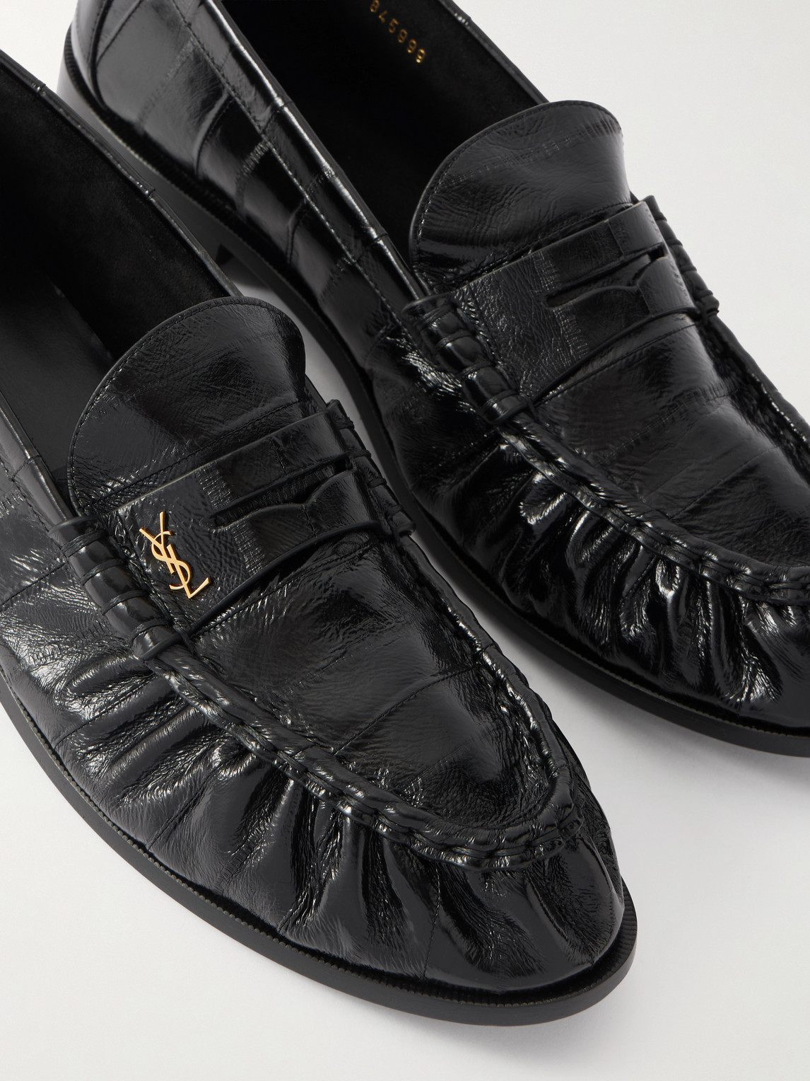Saint Laurent Le Loafer Monogram Logo-appliquéd Eel Penny Loafers In Black