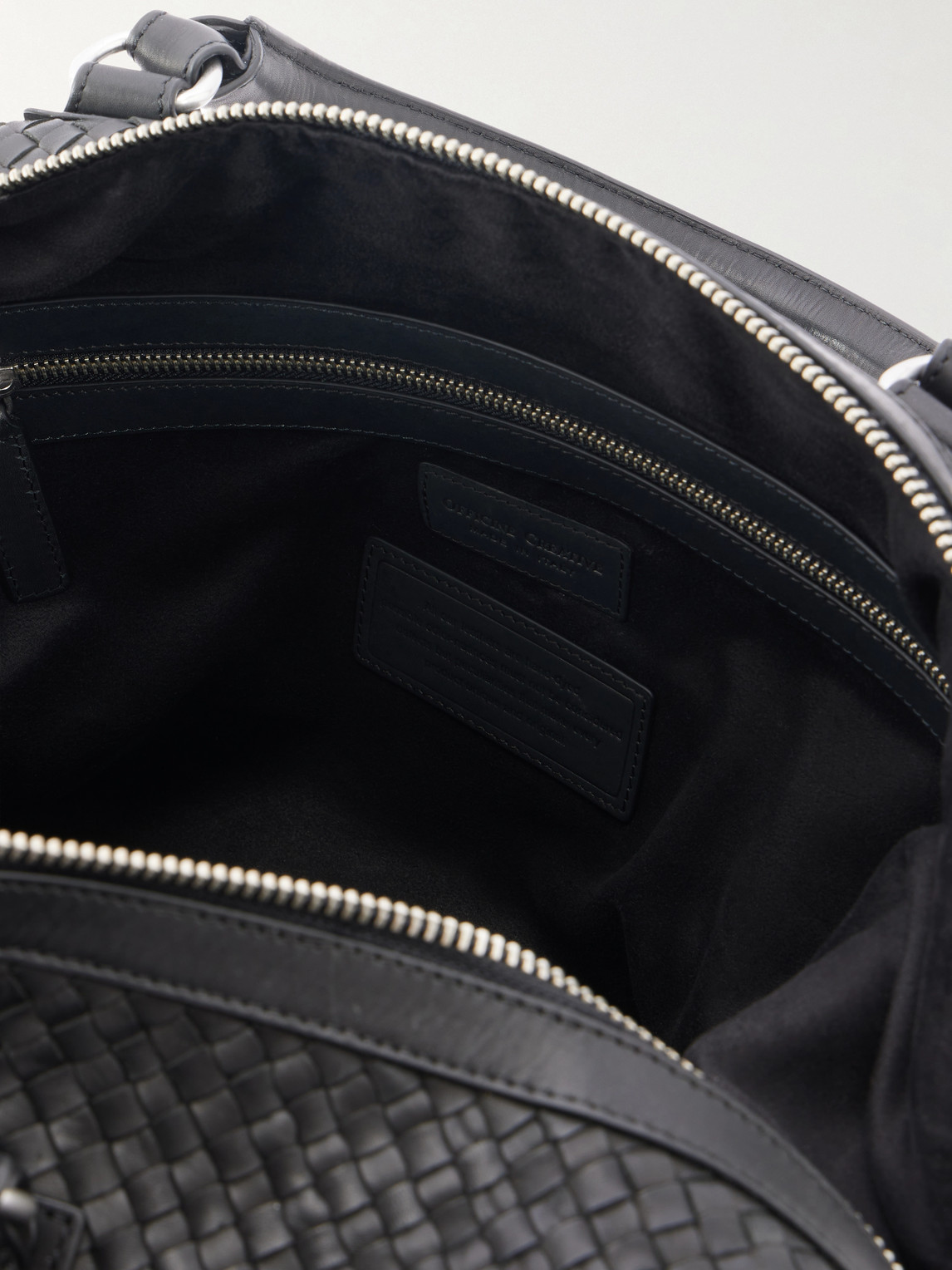 Officine Creative Woven Leather Weekend Bag In Black