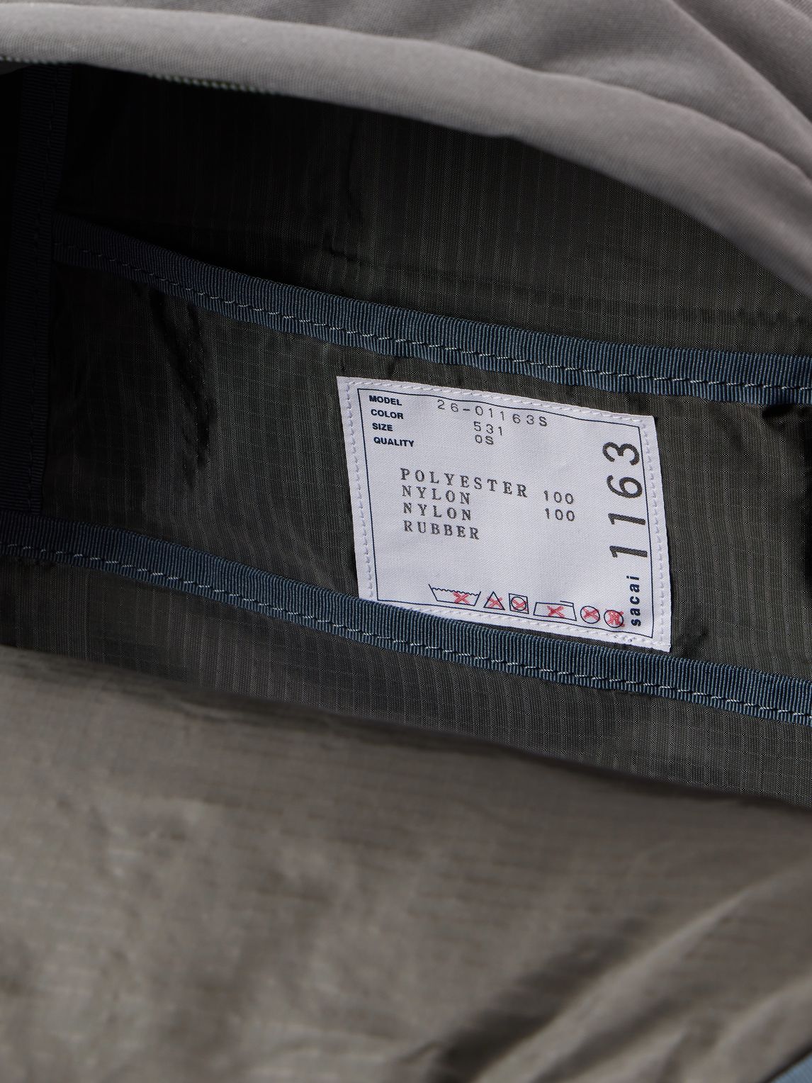 SACAI 로고 아플리케 셸 백팩