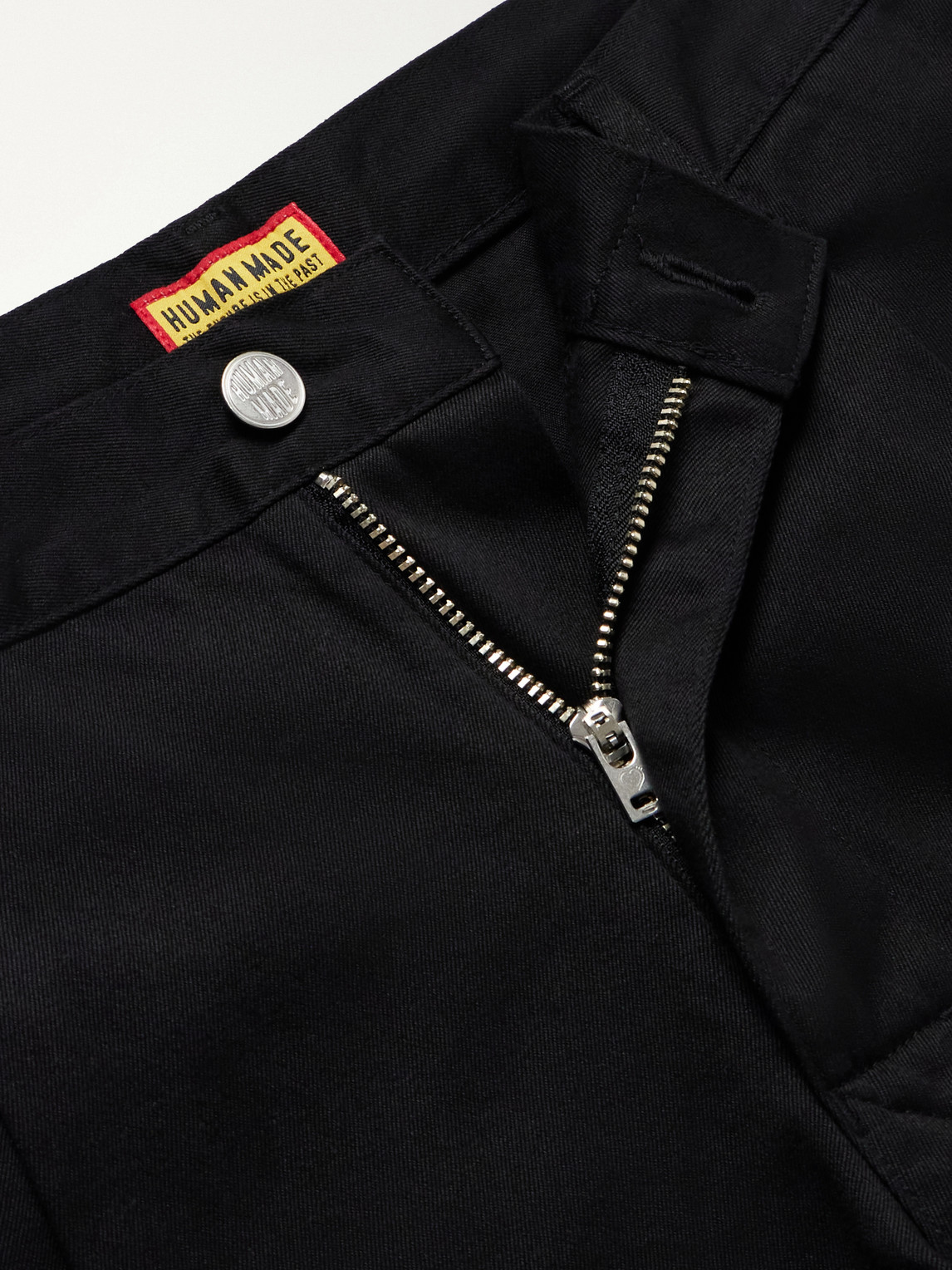 Tapered Pleated Cotton-Canvas Trousers