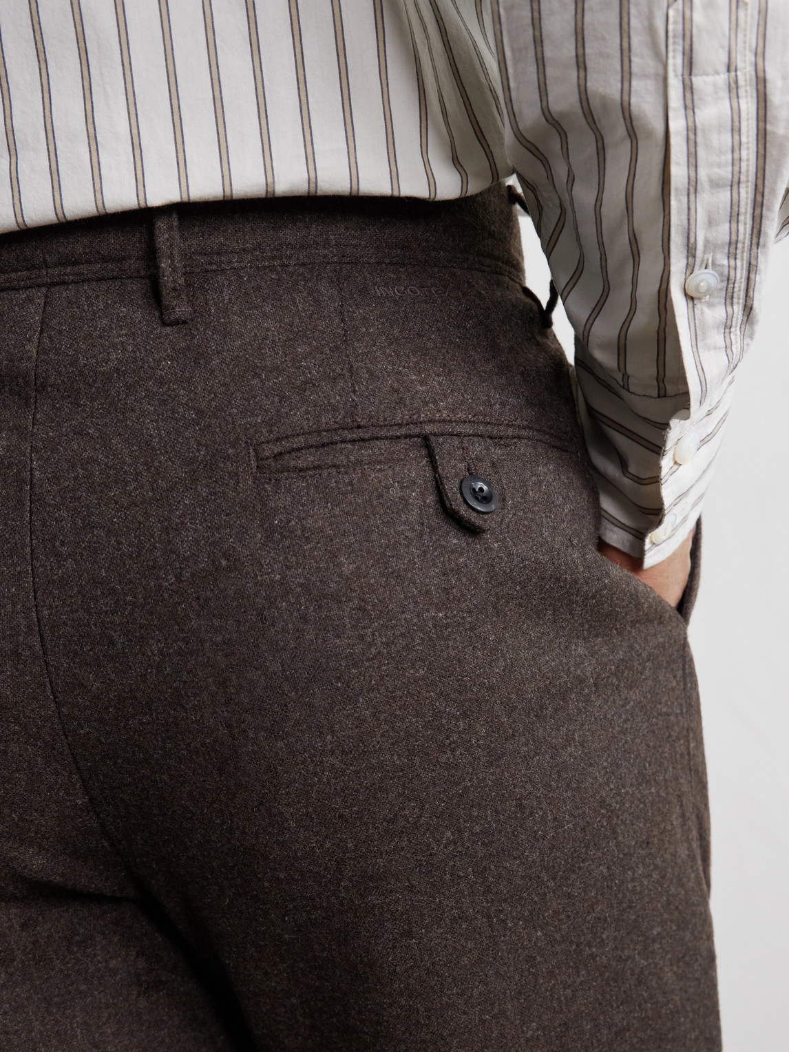 Tapered Pleated Wool-Blend Flannel Trousers