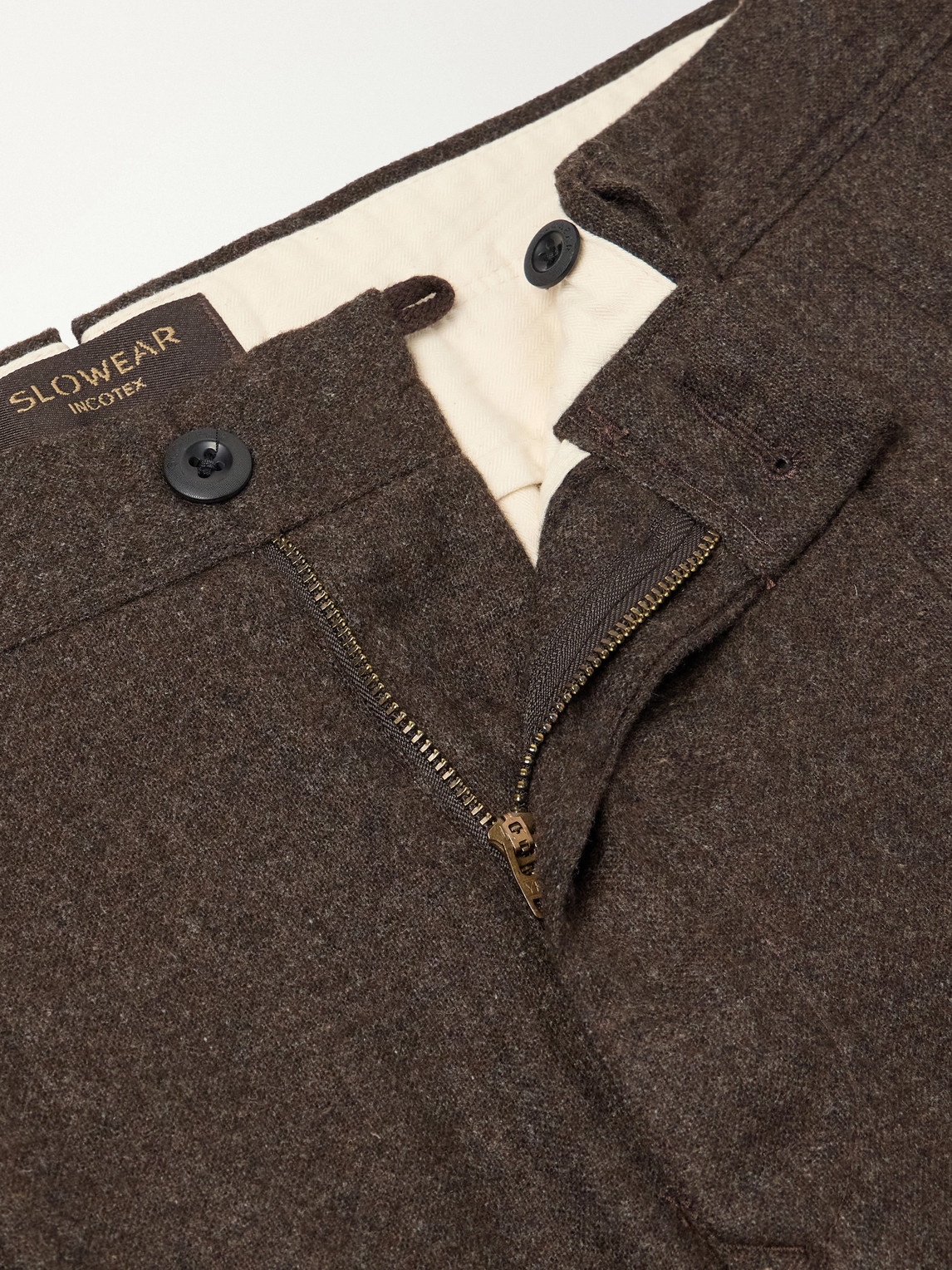 Tapered Pleated Wool-Blend Flannel Trousers