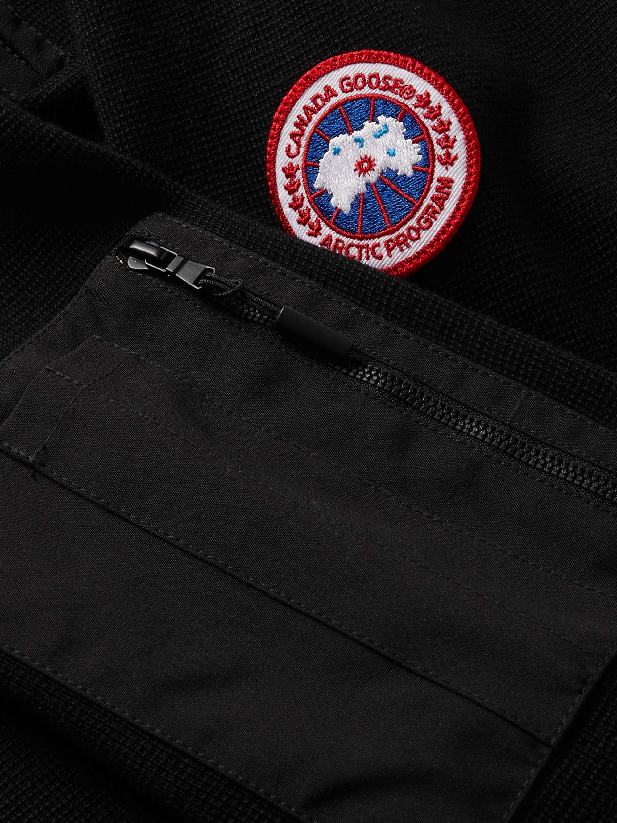 CANADA GOOSE كنزة Stormont بسحّاب نصفي وقصّة ضيّقة من صوف المارينو بحاشية من نسيج CORDURA